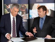 DST Chief, Science Partnerships and Engagement Division, Ian Dagley and CEO Sonartech Atlas, Mark Baker sign the new agreement.