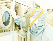 The Medical Countermeasures Consortium assists with all-hazard preparedness and response for Australia, Canada, the US and UK. An image of a scientist with protective clothing.