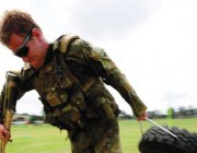 A solider pulling a tyre