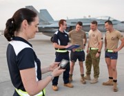 Alison Fogarty examines data recorded on Defence Science & Technology Group equipment as part of a heat study being conducted at Australia's main operating air base in the Middle East Region. Alison Fogarty examines data recorded on Defence Science & Technology Group equipment as part of a heat study being conducted at Australia's main operating air base in the Middle East Region.