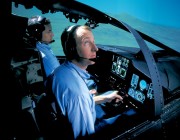 A photograph of a pilot taking part in an ALR 2002 radar warning reciever flight simulation 