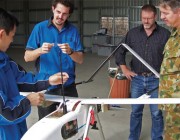 DST Group and Army personnel with the Australian-developed unmanned aerial vehicle, Aerosonde.