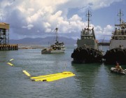 A photo of the Australian minesweeping and support system in the water