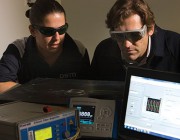 Two DST Group experts working on fibre laser sensors.