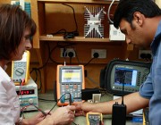 DST scientists working with electronics.