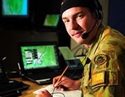 Australian Army soldier Signaller Liam McInerney of the 7th Combat Signals Regiment, monitors the battle management system in the joint operations room during Exercise Talisman Saber 2013, Queensland. 