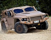 An armoured vehicle performs a driving test.