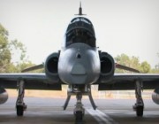 A Hawk Lead-in Fighter inside a hangar.