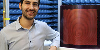 Joel Patniotis in an anechoic chamber with a sample DSTG-designed artificial impedance surface. One day reconfigurable antenna surfaces like this could be embedded in the surface of air, sea and land platforms.