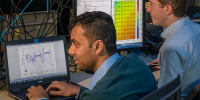 Bathiya Senanayake (left) and an RFTEQ team member developing and testing the new CATJAT system at DSTG Edinburgh.
