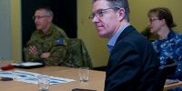 Dr Justin Fidock with Commander of Joint Task Force 629 for Operation COVID-19 Assist, Major General Paul Kenny (left), and Commander Joint Task Group 629.4 Air Commodore Margot Forster receive an update at Keswick Barracks, South Australia.