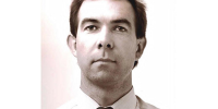 Black and white portrait of Michael Howlett