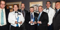 (L-R) Acting Secretary of the Department of Defence, Brendan Sergeant, Captain Carl Bird, Mike Bell (DSTO), Laurie Bird (DMO), Mark Pitt (DSTO), Wing Commander Joe Bennett and CDS Dr Alex Zelinsky. 