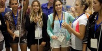 Sonar scientist David Matthews (centre rear) demonstrates the acoustic vibration properties of aluminium bars to indigenous students. 