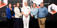 The NAVIGATE Team receives a 2024 VCDF Award from Vice Admiral David Johnston, AC, RAN. Pictured (L-R): Lisa Murdock, Sallyann Salmon, VCDF Vice Admiral David Johnson (presenting), Jessica Brophy and Benjamin Gray.